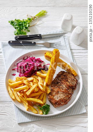 Texas Medium Rare Steak with Fries and Corn 135210190