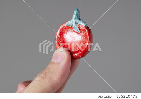 worry stone healing on gray background 135210475