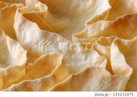 Close-up of Crispy Baked Pastry Layers in Natural Light 135211075
