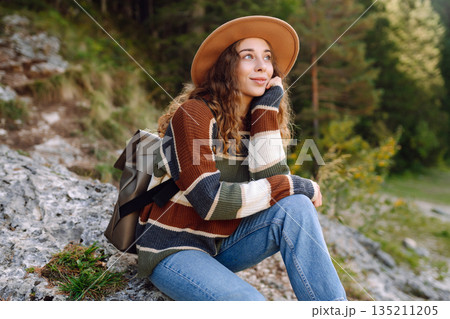 Adventure woman feeling happy among amazing mountains, forest and lake, enjoy the nature landscape 135211205