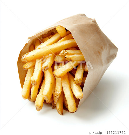 A brown paper bag filled with golden, crispy French fries is shown against a white background. 135211722