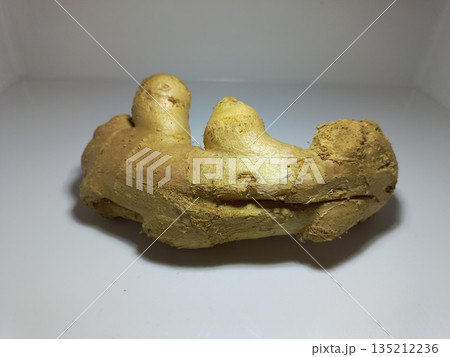 Fresh Ginger Root on White Background 135212236