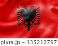 Albania national flag featuring red background and black double headed eagle. 135212797