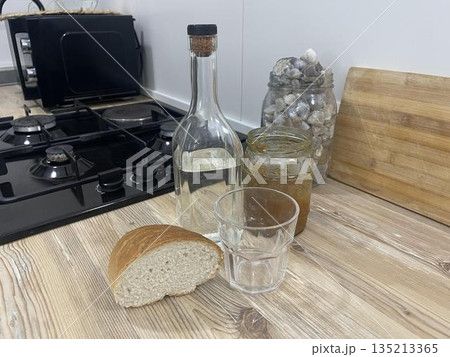 vodka with glasses on the holiday table 135213365