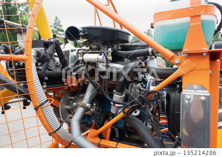 High pressure hydraulic hose system connected to steel pipes, close-up. Marine hydraulics. High pressure hydraulic hose system connected to steel pipes, close-up. Marine hydraulics. 135214286