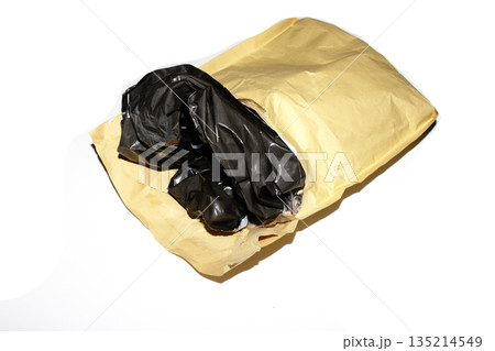 Packing envelope padded mailer bag opened and empty recycling shipping postal waste 135214549