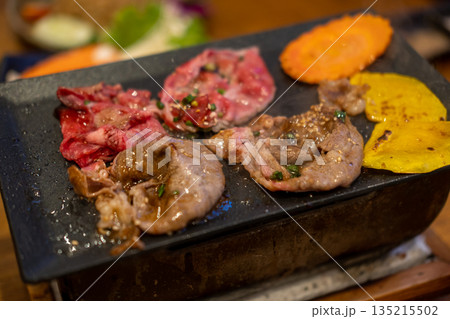 Wagyu beef sliced on the grill Wagyu beef sliced on the grill 135215502