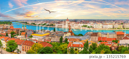 Budapest skyline panorama of Hungarian Parliament and Calvinist church on the Danube Budapest skyline panorama of Hungarian Parliament and Calvinist church on the Danube 135215769