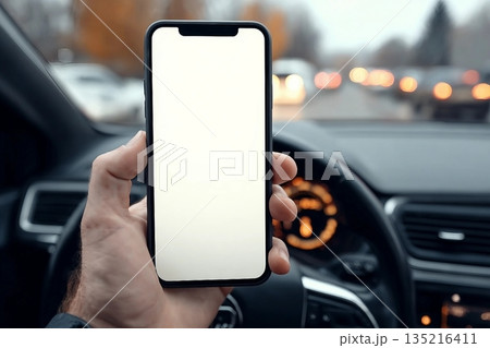 Smartphone mockup, man holding mobile phone in car, selective focus 135216411