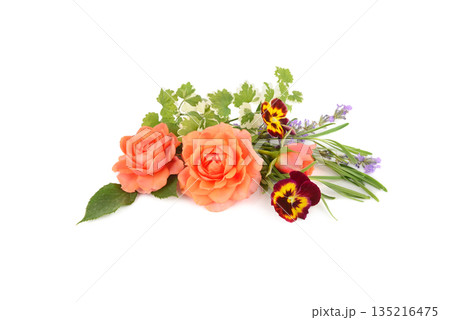 Vibrant floral arrangement with peach roses and pansies on white background Vibrant floral arrangement with peach roses and pansies on white background 135216475