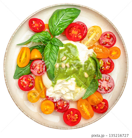 Burrata cheese salad with cherry tomatoes, basil and pesto isolated on white background, top view 135216727