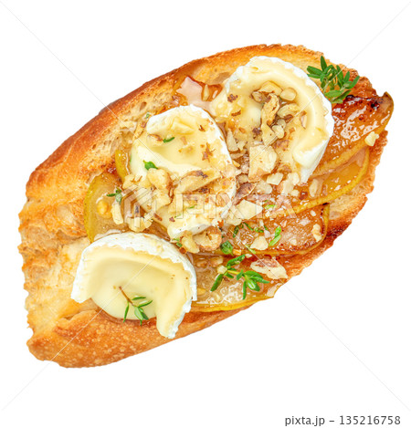 Toasted baguette sandwich with baked brie cheese, caramelized pear and nuts isolated on white background 135216758
