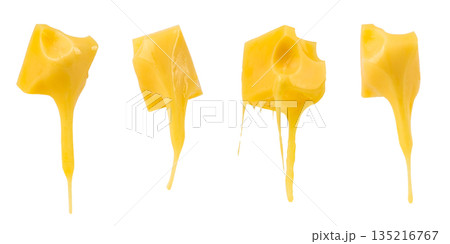 Set of melting yellow cheese cubes with dripping texture isolated on white background 135216767