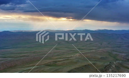Aerial view of mountains at sunset in Mongolia Aerial view of mountains at sunset in Mongolia 135217690