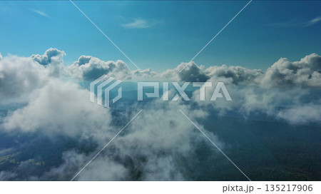 Clouds and mountains, flying in clouds Clouds and mountains, flying in clouds 135217906