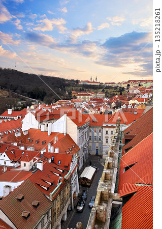 Old Prague street. Aerial view of old town with red roof and blue sky in Prague Old Prague street. Aerial view of old town with red roof and blue sky in Prague 135218261