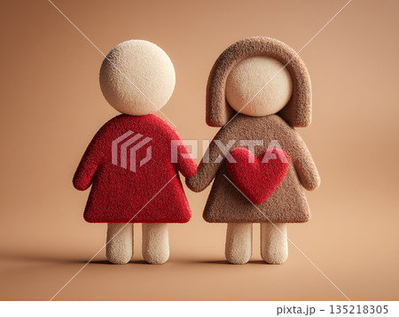 Two toy figures hold hands in celebration of Valentine's Day and love 135218305