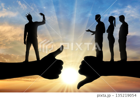 Selfishness and ego. An arrogant selfish man with a crown, considers himself better than other people. 135219054