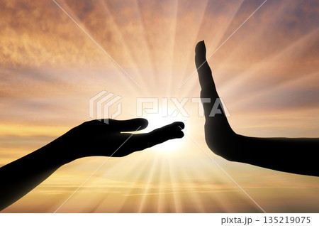 Selfishness and arrogance. One hand offers and asks, the other hand refuses, showing a stop gesture 135219075
