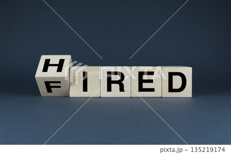 Cubes form the words Hired - Fired. Business and job concept 135219174