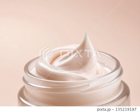 Close-up of creamy skincare product in jar with elegant texture and soft lighting for premium presentation Close-up of creamy skincare product in jar with elegant texture and soft lighting for premium presentation 135219197