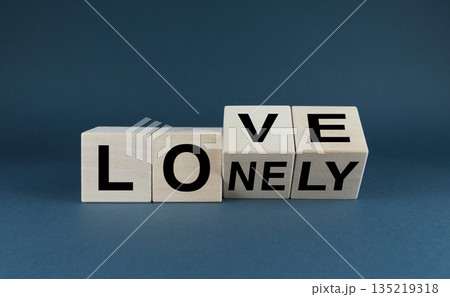 Lonely or love. Cubes form the expression Lonely or love. 135219318