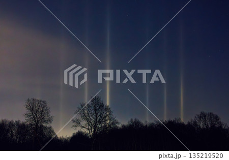 Light Pillars. Rare meteorological phenomena. Winter nature landscape Light Pillars. Rare meteorological phenomena. Winter nature landscape 135219520