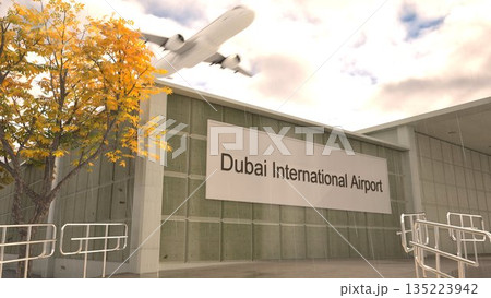 Dubai International Airport sign on terminal building with autumn tree and airplane, Dubai, United Arab Emirates 3D rendering 135223942