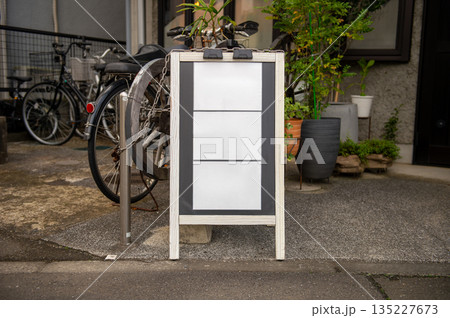 Large blank billboard on a street wall, banners with room to add your own text 135227673