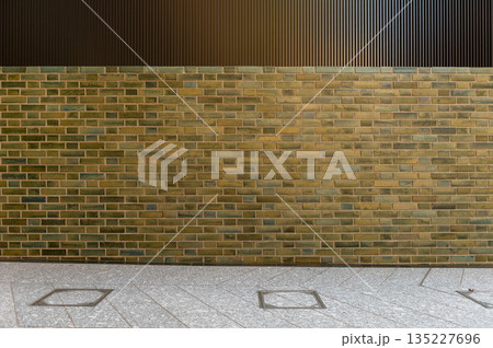 street wall background ,Industrial background, empty grunge urban street with warehouse brick wall street wall background ,Industrial background, empty grunge urban street with warehouse brick wall 135227696