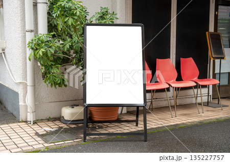 Large blank billboard on a street wall, banners with room to add your own text 135227757
