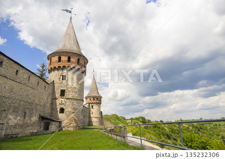 Majestic towers and walls of the Old Fortress in Kamianets-Podilskyi, Ukraine 135232306