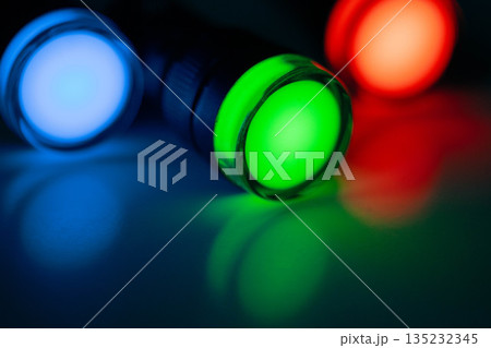 Colorful LED indicator lights representing technology status and system signals Colorful LED indicator lights representing technology status and system signals 135232345