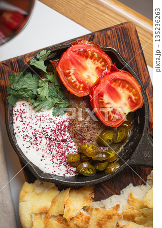 Georgian appetizer served in cast iron skillet Georgian appetizer served in cast iron skillet 135236263
