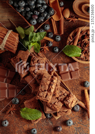 Brownie with blueberries and mint. 135236600