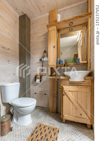 Rustic bathroom interior with wooden walls and vessel sink Rustic bathroom interior with wooden walls and vessel sink 135237952