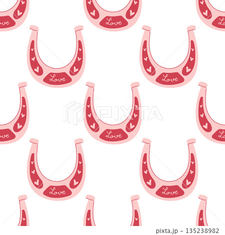 A seamless pattern with cute pink horseshoe with doodle hearts. Valentine's day print for horse riders. Wallpaper, background, notebook cover template 135238982
