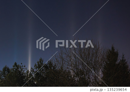 Light Pillars. Rare meteorological phenomena. Winter nature landscape Light Pillars. Rare meteorological phenomena. Winter nature landscape 135239654