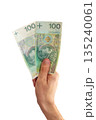 Old and new one version of 100 PLN banknote in hand. 135240061