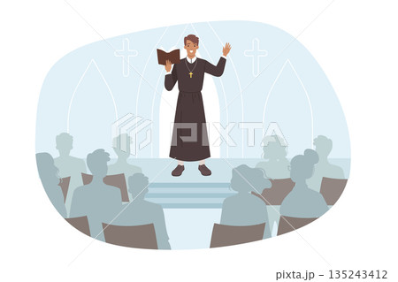 Catholic priest reads sermon in church, standing on stage in front of parishioners 135243412