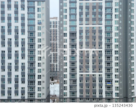Exterior of a Newly Built Modern Apartment in Korea, Featuring Repetitive Geometric Window Patterns Exterior of a Newly Built Modern Apartment in Korea, Featuring Repetitive Geometric Window Patterns 135243430
