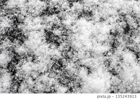 Snow surface, snow flake structure, or freezing cold winter background Snow surface, snow flake structure, or freezing cold winter background 135243913