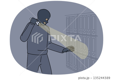 Spy steals documents and confidential data from office using flashlight and wearing mask Spy steals documents and confidential data from office using flashlight and wearing mask 135244389