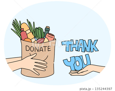 Bag food in hands of man near inscription thank you, for concept charity and helping people in need 135244397