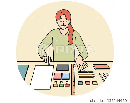 Perfectionist woman with OCD syndrome puts things in order on desktop and workplace 135244450