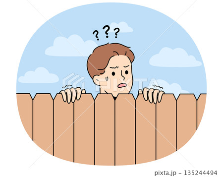 Curious neighbor looks over fence to find out what is happening on street or to spy Curious neighbor looks over fence to find out what is happening on street or to spy 135244494