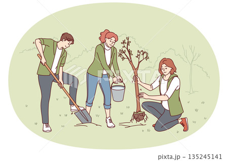 Volunteers plant trees and water seedlings to save nature from co2 emissions and climate change 135245141