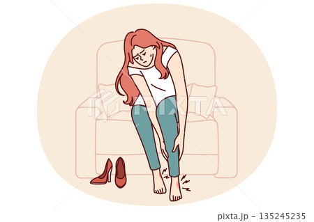 Woman suffers from pain in legs or varicose veins due to use of uncomfortable shoes with high heels 135245235