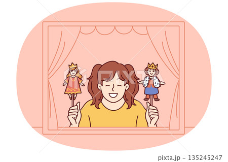 Girl performs in puppet theater showing scene with prince and princess from children story Girl performs in puppet theater showing scene with prince and princess from children story 135245247