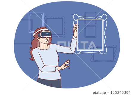 Woman in VR headset stands among virtual paintings visiting digital museum with art exhibition Woman in VR headset stands among virtual paintings visiting digital museum with art exhibition 135245394